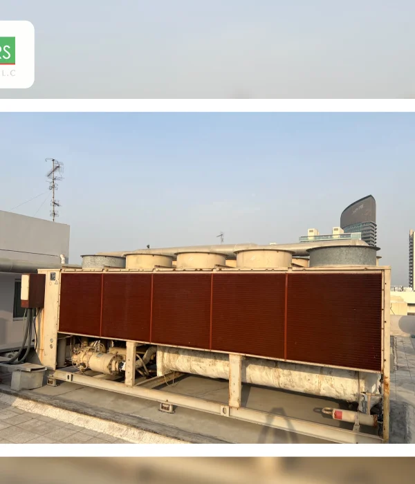Rooftop industrial chiller system featuring a large heat exchanger for efficient cooling performance 